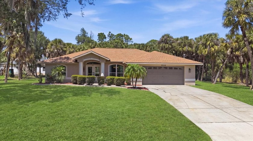 Enjoy More Room to Live and Entertain with This Double Lot Pool - Beach Home for sale in North Port, Florida on Beachhouse.com