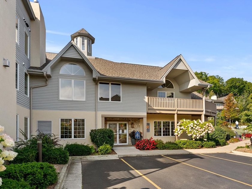 This two bedroom, two bath second floor unit is in the main - Beach Condo for sale in Sister Bay, Wisconsin on Beachhouse.com