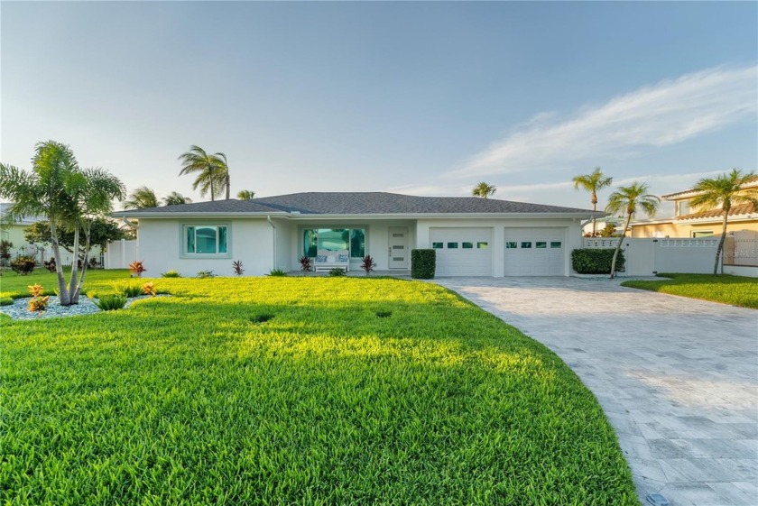 Welcome to your dream home! This exquisite three-bedroom - Beach Home for sale in Belleair Beach, Florida on Beachhouse.com