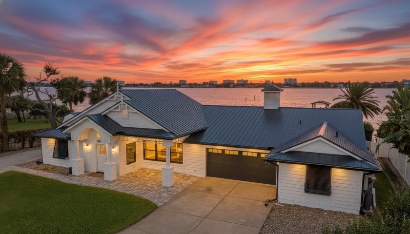 Following a major renovation, this striking waterfront pool home - Beach Home for sale in Ormond Beach, Florida on Beachhouse.com