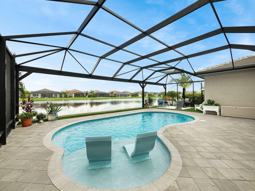 Welcome to this stunning lakefront pool home in the highly - Beach Home for sale in Port Saint Lucie, Florida on Beachhouse.com