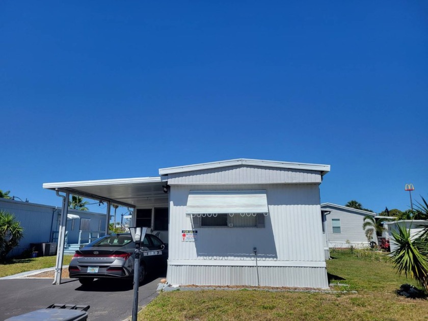 Rare Find! Spacious Single-Wide with Double Florida Rooms & - Beach Home for sale in West Palm Beach, Florida on Beachhouse.com
