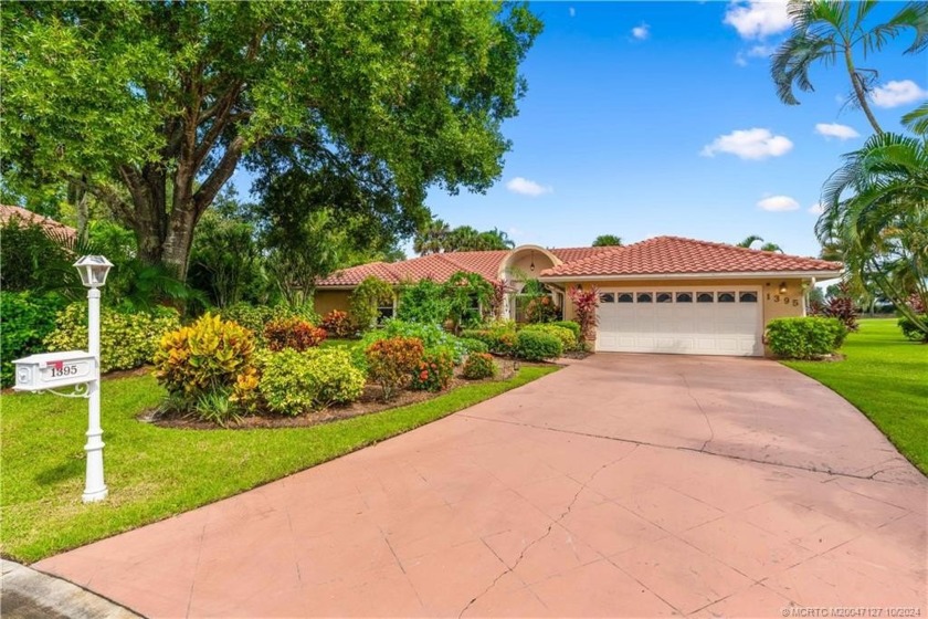 Welcome to this beautifully landscaped 4 bedroom, 2 bath home - Beach Home for sale in Port Saint Lucie, Florida on Beachhouse.com