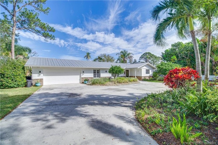 This beautiful 3 bedroom, 2 bath pool home with HUGE private - Beach Home for sale in Stuart, Florida on Beachhouse.com