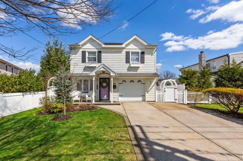Welcome to this beautifully maintained split level colonial in - Beach Home for sale in Massapequa, New York on Beachhouse.com