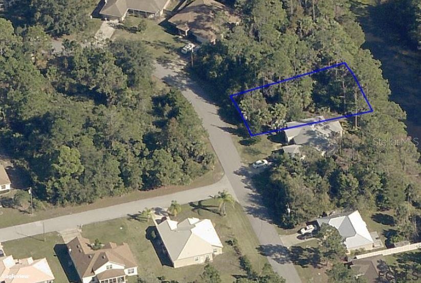 Freshwater canal lot in growing area.  Near Rymfire Elementary - Beach Lot for sale in Palm Coast, Florida on Beachhouse.com