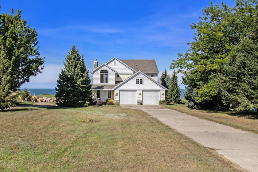 Beautiful Lake Michigan home with 88 ft of Private Frontage and - Beach Home for sale in Ludington, Michigan on Beachhouse.com