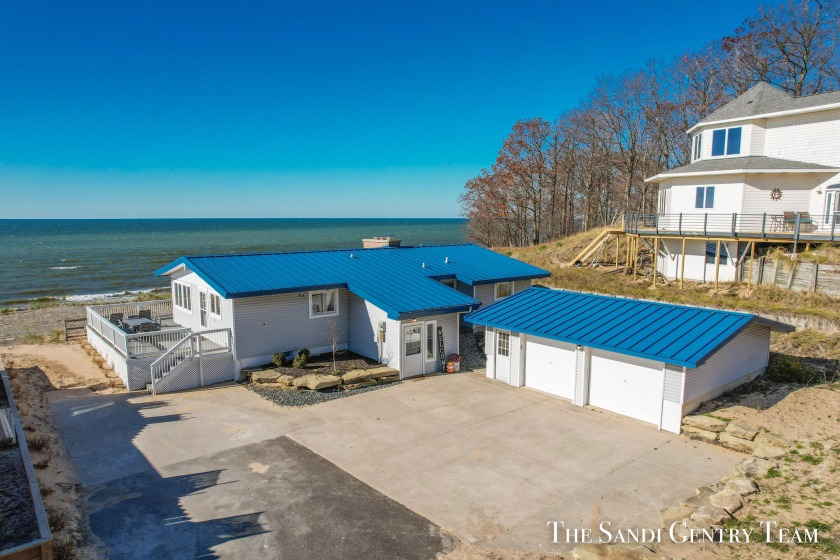 100' of Prime Lake Michigan Frontage is the setting for this - Beach Home for sale in Grand Haven, Michigan on Beachhouse.com