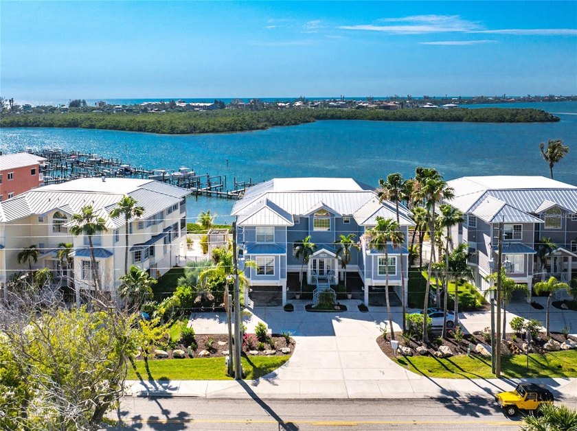 Waterfront living at its finest in Sandpiper Key! This - Beach Condo for sale in Englewood, Florida on Beachhouse.com