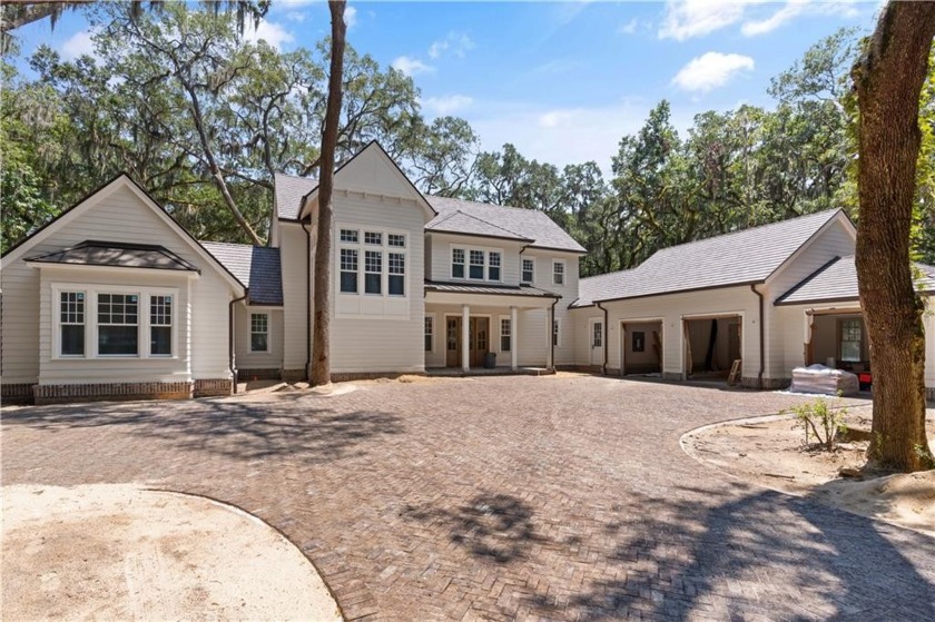 Situated along a protected, wooded area called the Rookery in - Beach Home for sale in Saint Simons, Georgia on Beachhouse.com