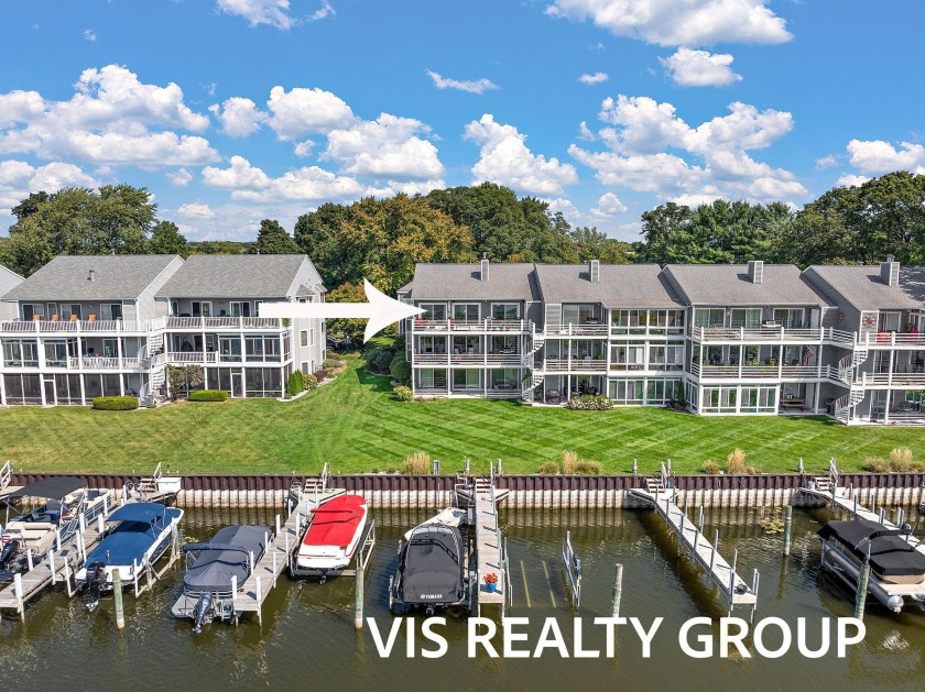 Sunsets, boating, and easy living await! This stunning top-floor - Beach Condo for sale in Spring Lake, Michigan on Beachhouse.com