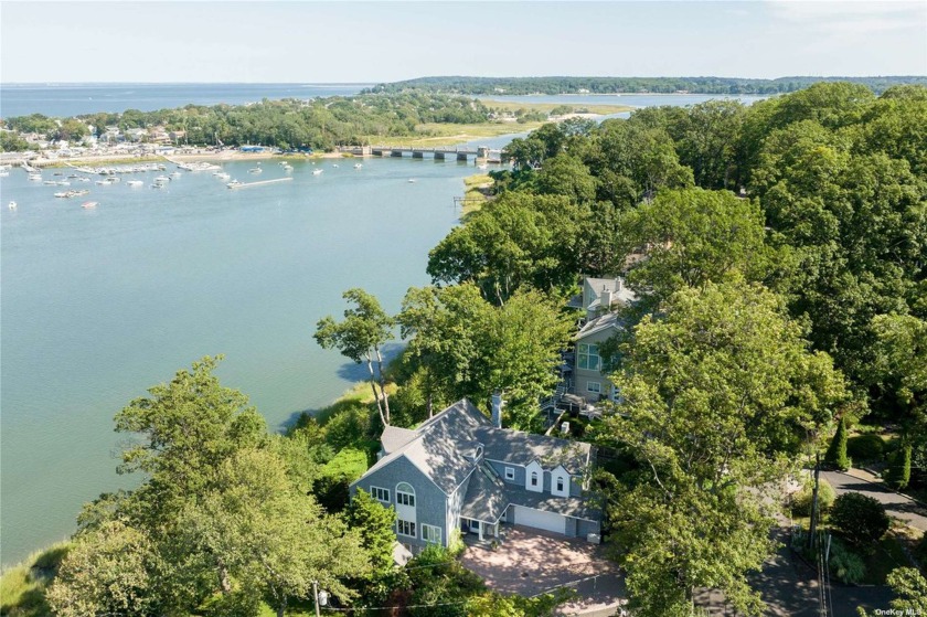 Prepare to be swept away by the epitome of waterfront living in - Beach Home for sale in Oyster Bay, New York on Beachhouse.com