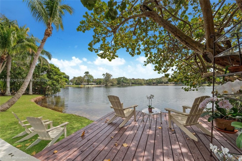 Privacy gates open to a deep lake-front acre and private oasis - Beach Home for sale in Coral Gables, Florida on Beachhouse.com