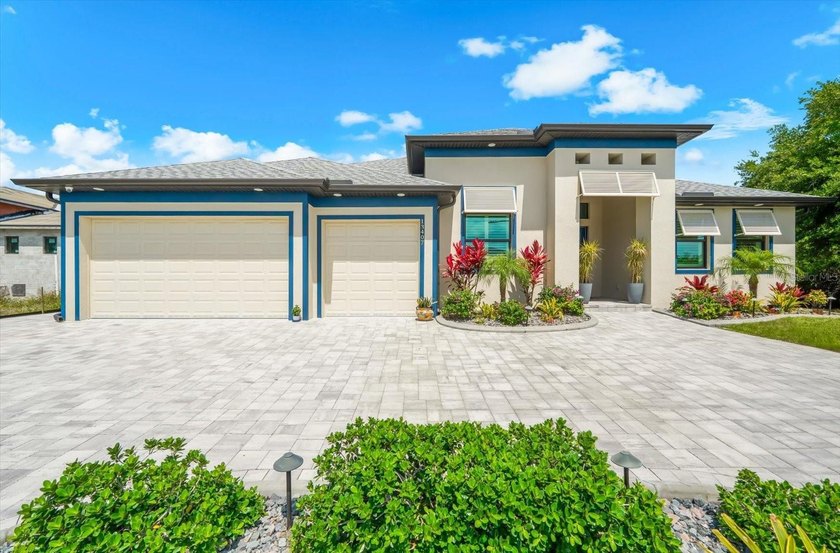 WELCOME TO YOUR WATERFRONT SHOWSTOPPER--STUNNING 4 BEDROOM, 3 - Beach Home for sale in Port Charlotte, Florida on Beachhouse.com
