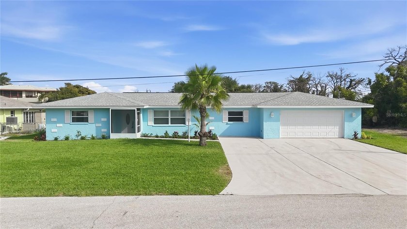 Experience refined coastal living in this exceptional waterfront - Beach Home for sale in Englewood, Florida on Beachhouse.com