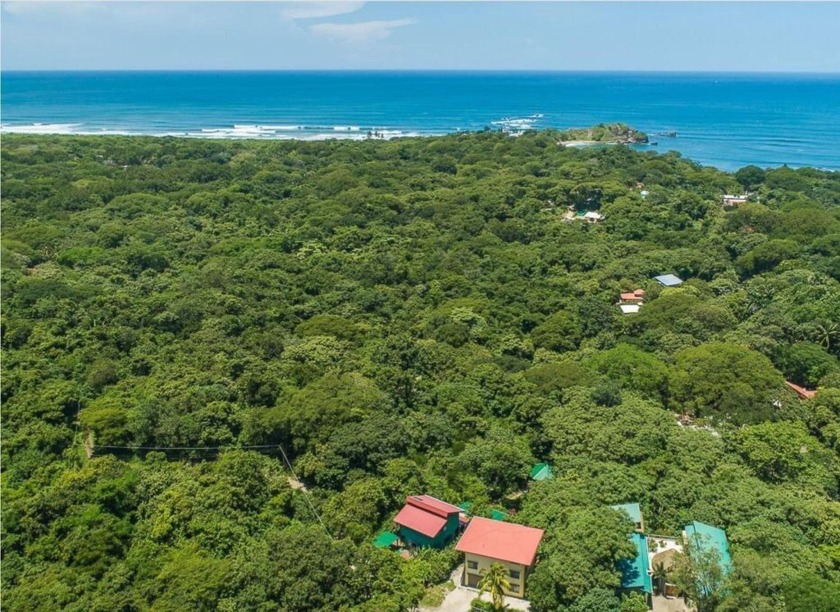 This extraordinary 1600 sqm property on Playa Pelada hill offers - Beach Townhome/Townhouse for sale in Nosara,  on Beachhouse.com