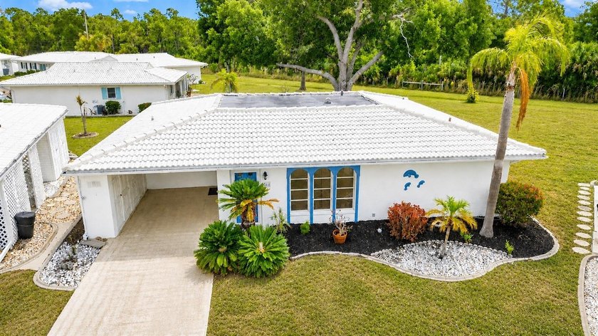 This clean and well-maintained furnished villa backs up to - Beach Home for sale in Venice, Florida on Beachhouse.com