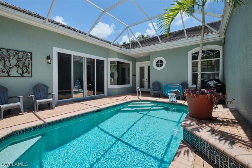 This beautiful courtyard villa is high and dry. NO WATER OR - Beach Home for sale in Bonita Springs, Florida on Beachhouse.com