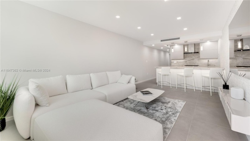 Discover the epitome of luxury on Hibiscus Island with this - Beach Condo for sale in Miami Beach, Florida on Beachhouse.com