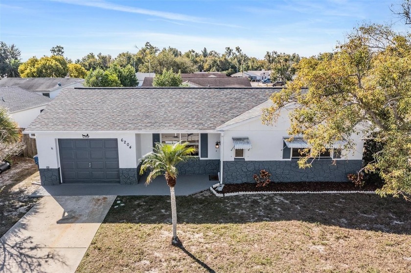 Welcome to this well maintained 3/2/1 home. (Roof: 2019) - Beach Home for sale in New Port Richey, Florida on Beachhouse.com