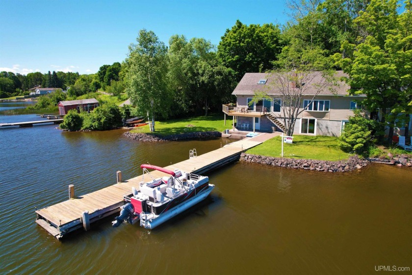 This is the location on the Portage Lake that many dream of! - Beach Home for sale in Houghton, Michigan on Beachhouse.com