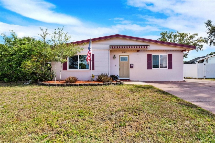 Lakefront beauty in desirable Meadowlawn! This updated pool home - Beach Home for sale in St. Petersburg, Florida on Beachhouse.com