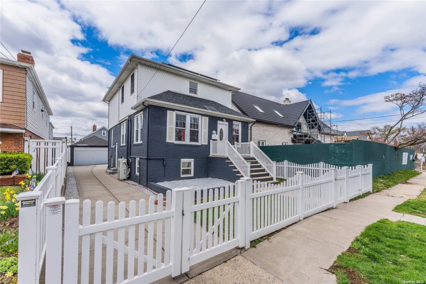 Discover modern comfort and convenience in this fully renovated - Beach Home for sale in Howard Beach, New York on Beachhouse.com