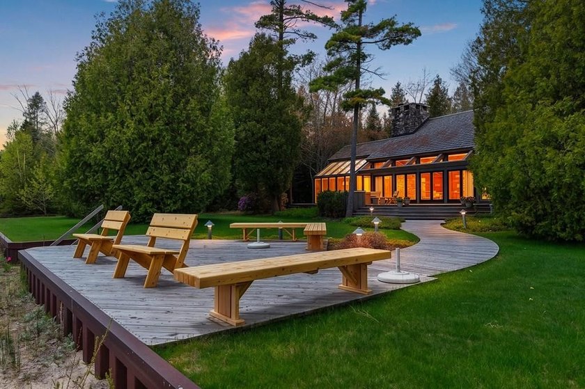 Beyond a private gated entrance lies an extraordinary waterfront - Beach Home for sale in Baileys Harbor, Wisconsin on Beachhouse.com