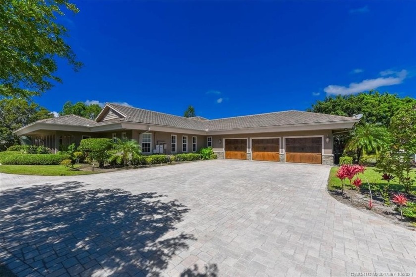 Beautiful courtyard resort style pool home with open concept - Beach Home for sale in Palm City, Florida on Beachhouse.com