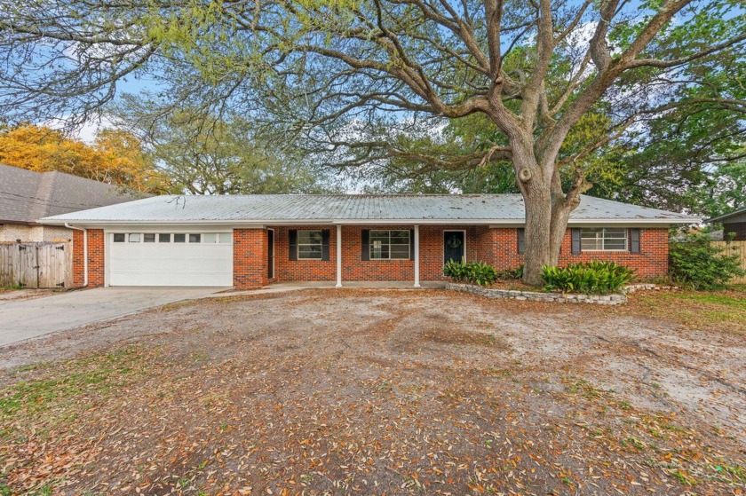 Step into this light filled home in the highly desired - Beach Home for sale in Fort Walton Beach, Florida on Beachhouse.com