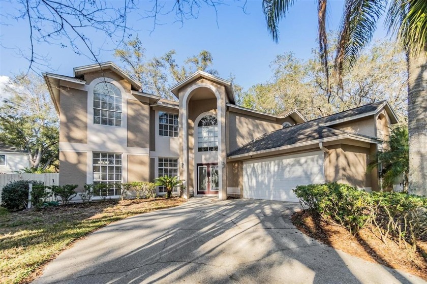 Spacious 5 Bedrooms, 2.5 Bath, 2 side Car Garage, a Florida Room - Beach Home for sale in Tampa, Florida on Beachhouse.com