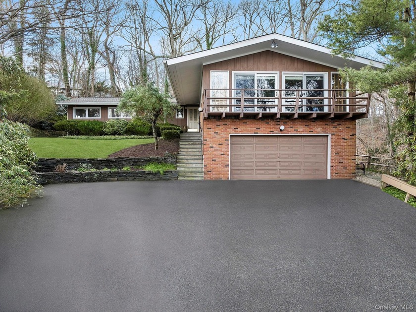 Tucked away at the end of a private Centerport Lane, this - Beach Home for sale in Centerport, New York on Beachhouse.com