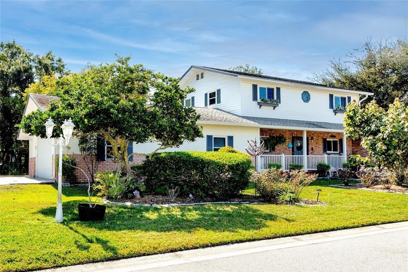 Enchanting, one-of-a-kind, custom home with private boat dock on - Beach Home for sale in Palm Harbor, Florida on Beachhouse.com