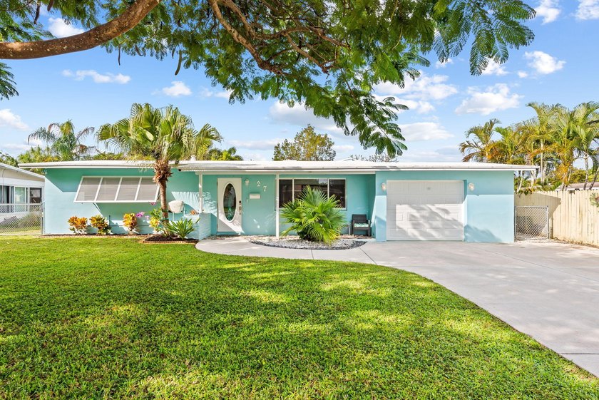Set on an oversized lot rarely found at this price point and - Beach Home for sale in Pompano Beach, Florida on Beachhouse.com