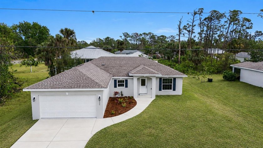 This stunning modern new construction home offers a layout - Beach Home for sale in Port Charlotte, Florida on Beachhouse.com