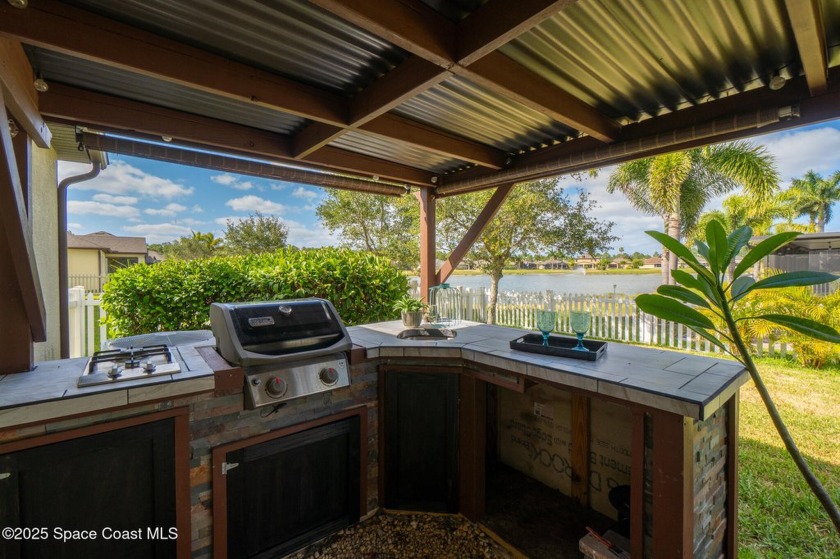 Highlights Upfront: Breathtaking Lake Views, Outdoor Kitchen - Beach Home for sale in Palm Bay, Florida on Beachhouse.com