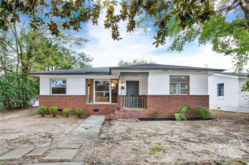 Discover this timeless ranch-style residence at 1118 W 49th St - - Beach Home for sale in Savannah, Georgia on Beachhouse.com
