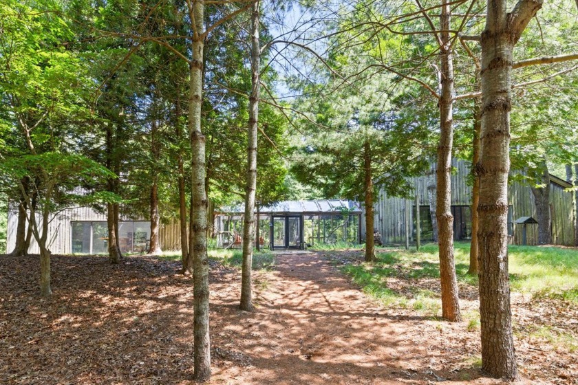 Tucked deep within East Hampton's storied Northwest Woods, this - Beach Home for sale in East Hampton, New York on Beachhouse.com