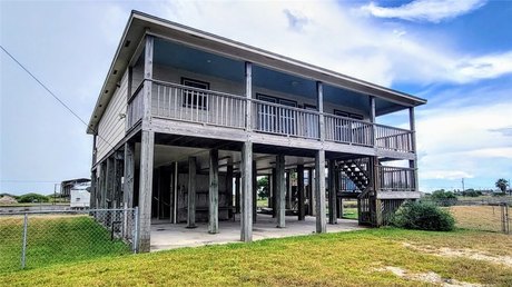 Coastal cabin with over 130' of canal frontage on a double lot - Beach Home for sale in Rockport, Texas on Beachhouse.com