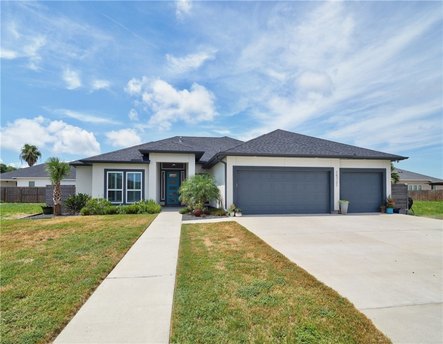 Open-concept home featuring 10-foot ceilings and an abundance of - Beach Home for sale in Corpus Christi, Texas on Beachhouse.com