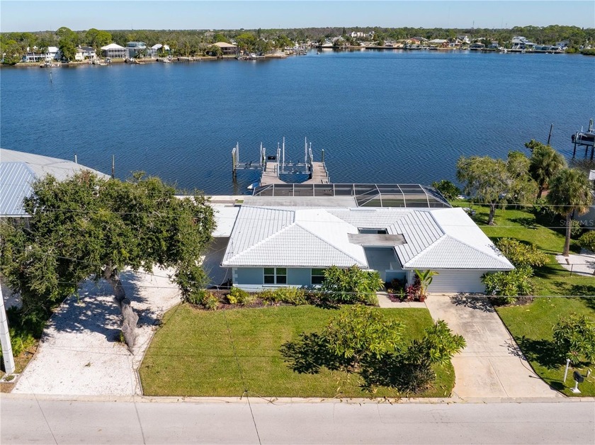 Waterfront Paradise on Miller's Bayou - Double Lot with 151 Feet - Beach Home for sale in Port Richey, Florida on Beachhouse.com