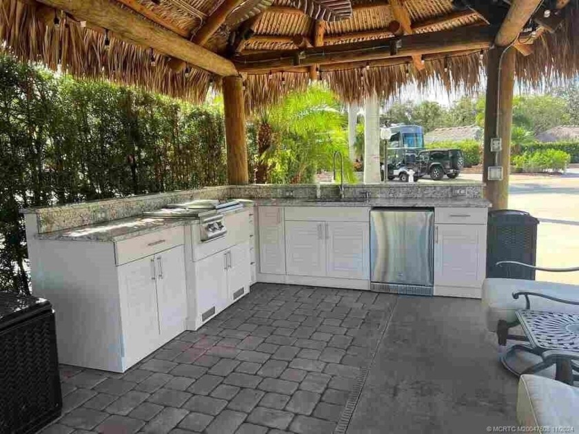 Peaceful Waterfront Lot with Tropical Views and Cozy Tiki - Beach Lot for sale in Port Saint Lucie, Florida on Beachhouse.com