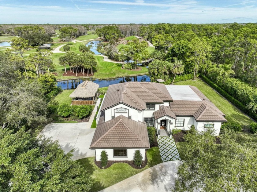 This ONE-OF-A-KIND custom built home on 1.25 acres on a private - Beach Home for sale in Jupiter, Florida on Beachhouse.com