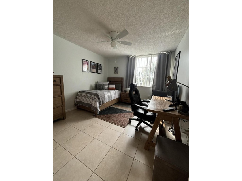 This 3-bedroom, 2-bathroom condo offers stunning lake views from - Beach Condo for sale in Lake Worth, Florida on Beachhouse.com