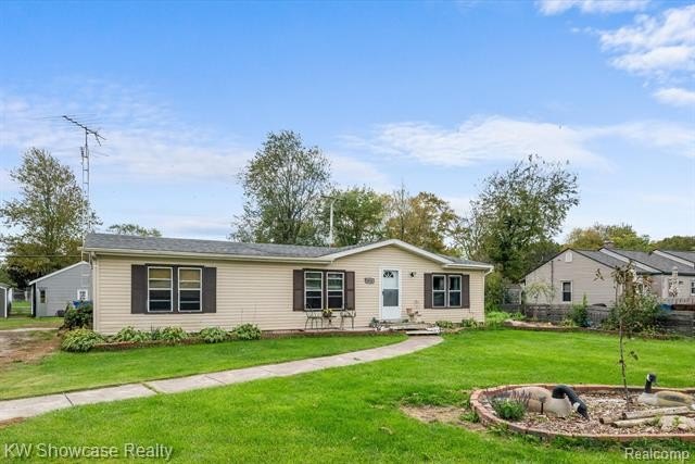 Welcome to this well-maintained ranch-style home, featuring - Beach Home for sale in Monroe, Michigan on Beachhouse.com