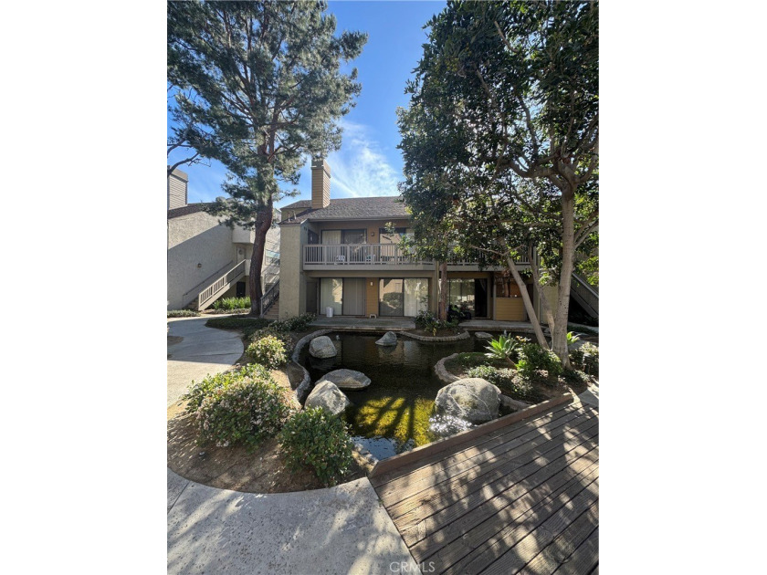 Escape to the peaceful village of Lakeside with this rare - Beach Condo for sale in Garden Grove, California on Beachhouse.com