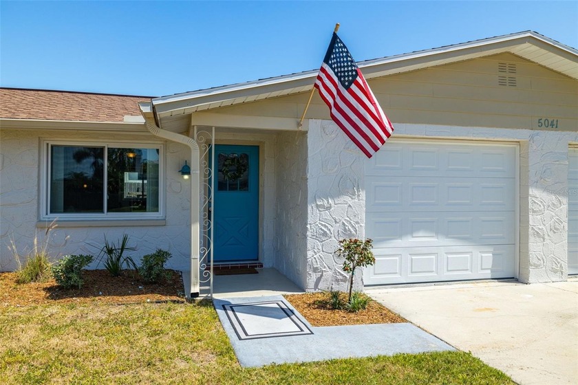 This charming 2-bedroom, 2-bath home features a spacious 2-car - Beach Home for sale in Port Richey, Florida on Beachhouse.com