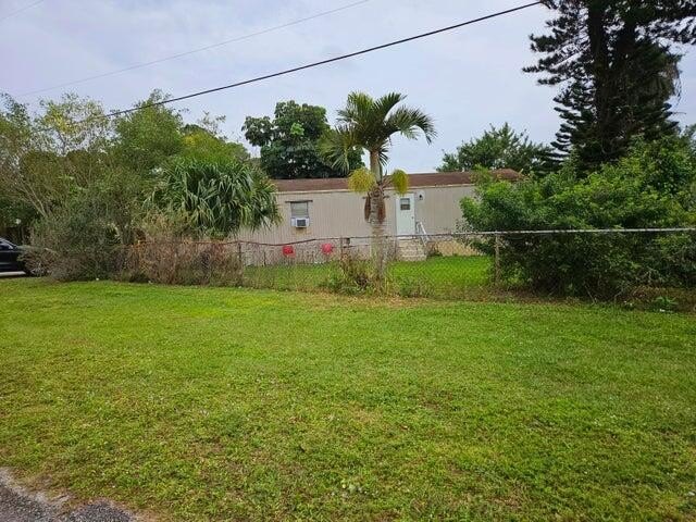 Big corner lot with 2/1 mobile home and huge storage shed. Close - Beach Home for sale in West Palm Beach, Florida on Beachhouse.com