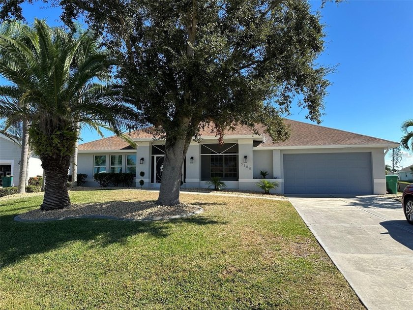Experience the ultimate in luxury waterfront living in this - Beach Home for sale in Port Charlotte, Florida on Beachhouse.com