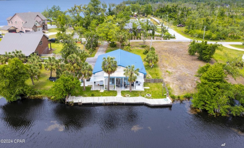 Do you dream of living in a Lakefront cottage home on Deerpoint - Beach Home for sale in Panama City, Florida on Beachhouse.com